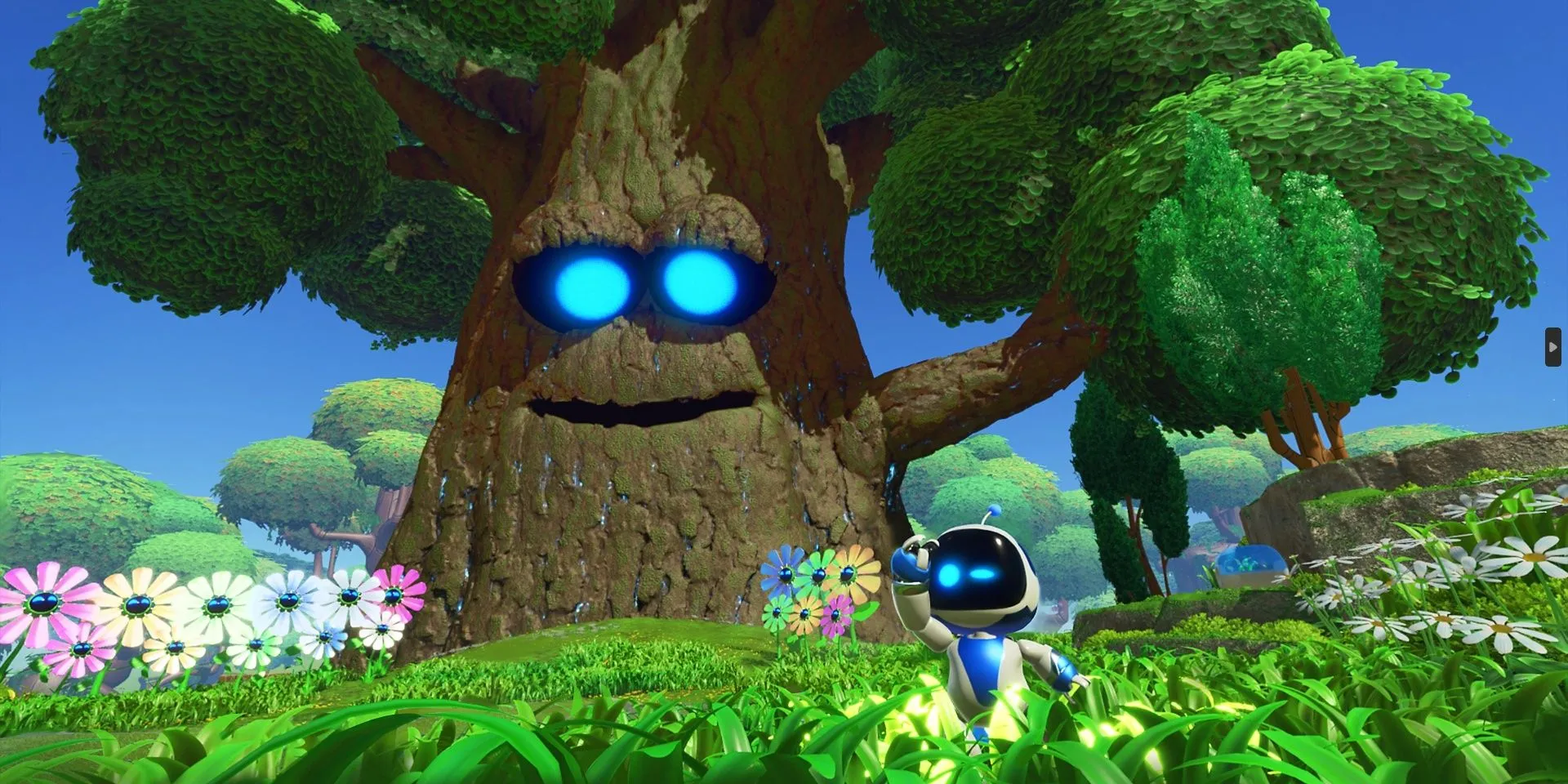 Astro Bot và Papa Tree trong khung cảnh tươi sáng của Astro Bot