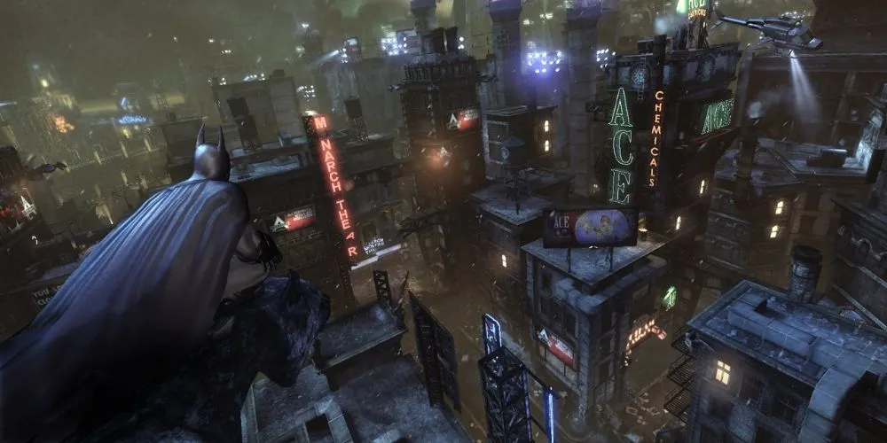 Batman quan sát thành phố Arkham City từ trên cao, chuẩn bị cho một pha hành động lén lút