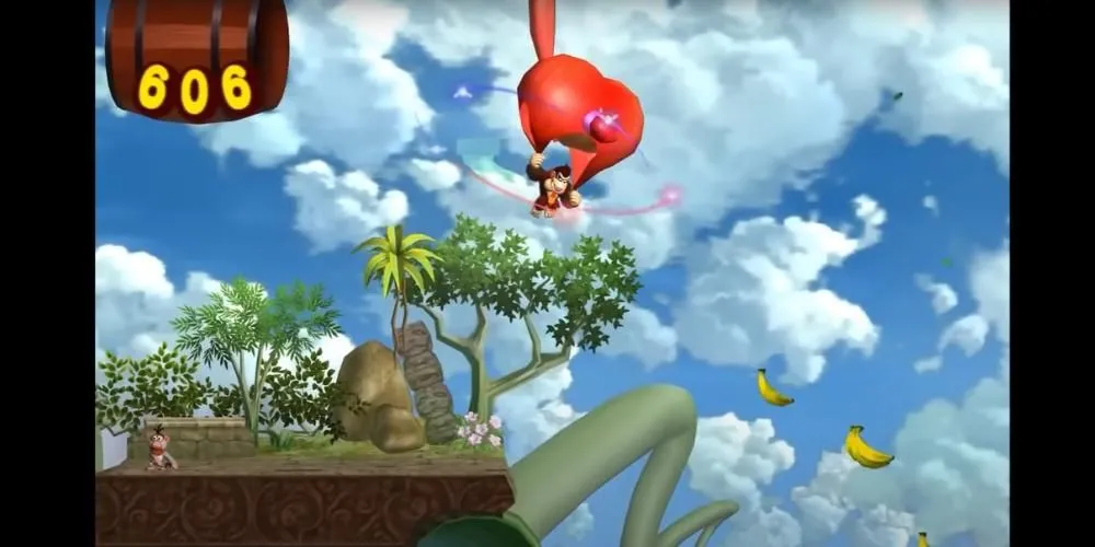 Donkey Kong dùng dù đáp xuống thu thập chuối trong game platform Donkey Kong Jungle Beat