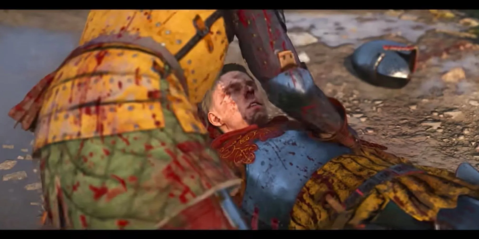 Một người đàn ông bị thương đang ngồi nghỉ trong Kingdom Come Deliverance 2, cho thấy sự khắc nghiệt của chiến đấu