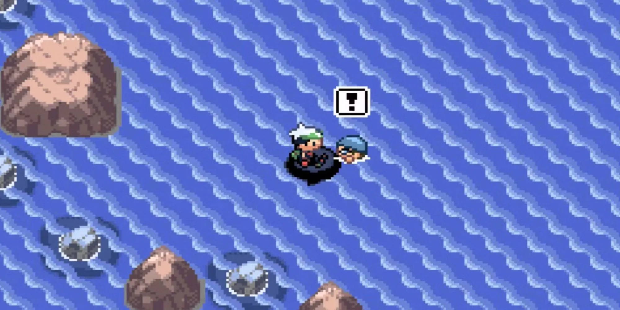 Nhân vật người chơi đang lướt sóng trên lưng Pokemon trong Pokemon Ruby Sapphire, một huấn luyện viên khác xuất hiện trên bờ