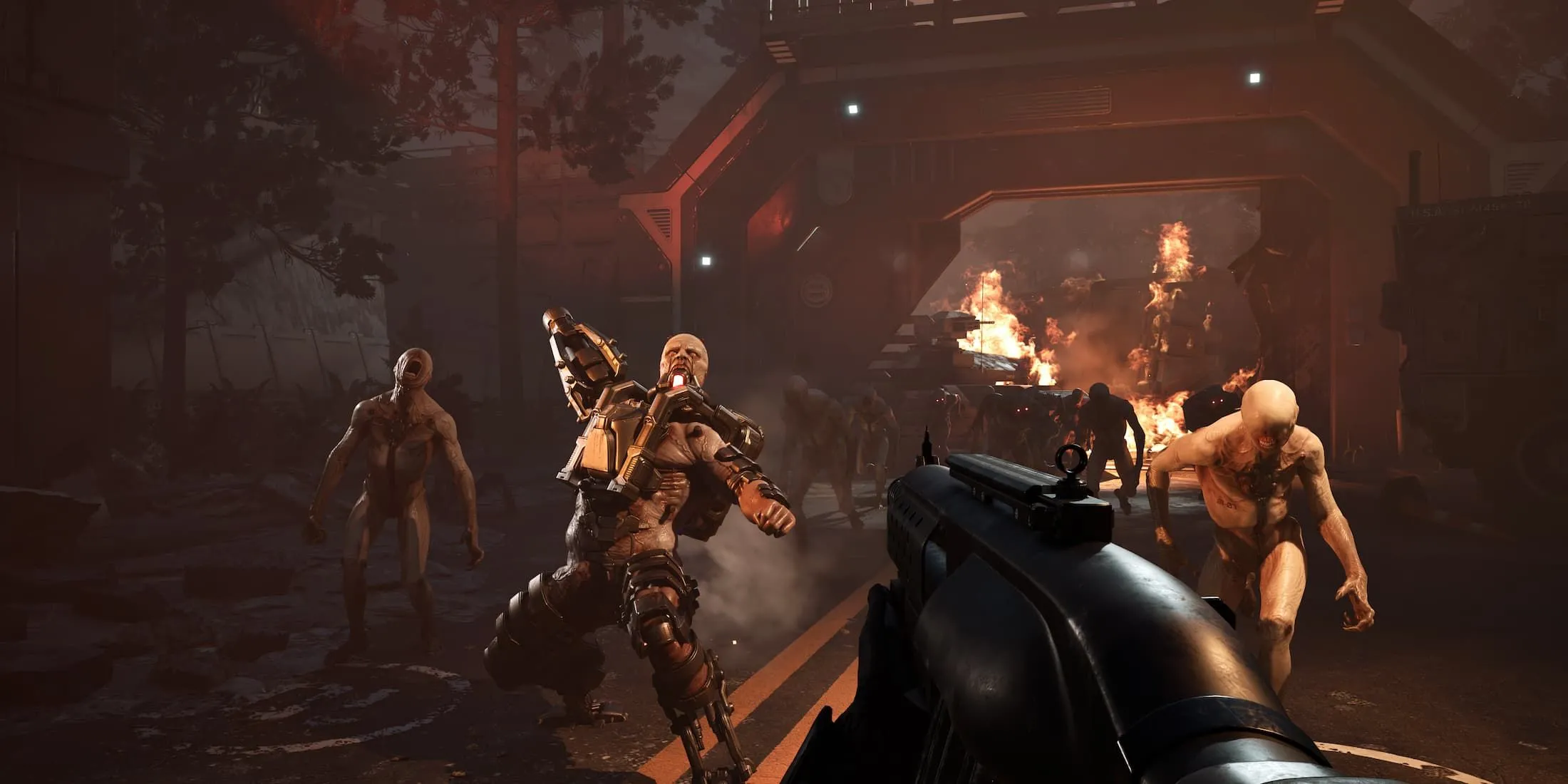 Bầy quái vật Husk và Cyst trong Killing Floor 3 tấn công người chơi, minh họa sự cần thiết của Multi-tool để kích hoạt phòng thủ.