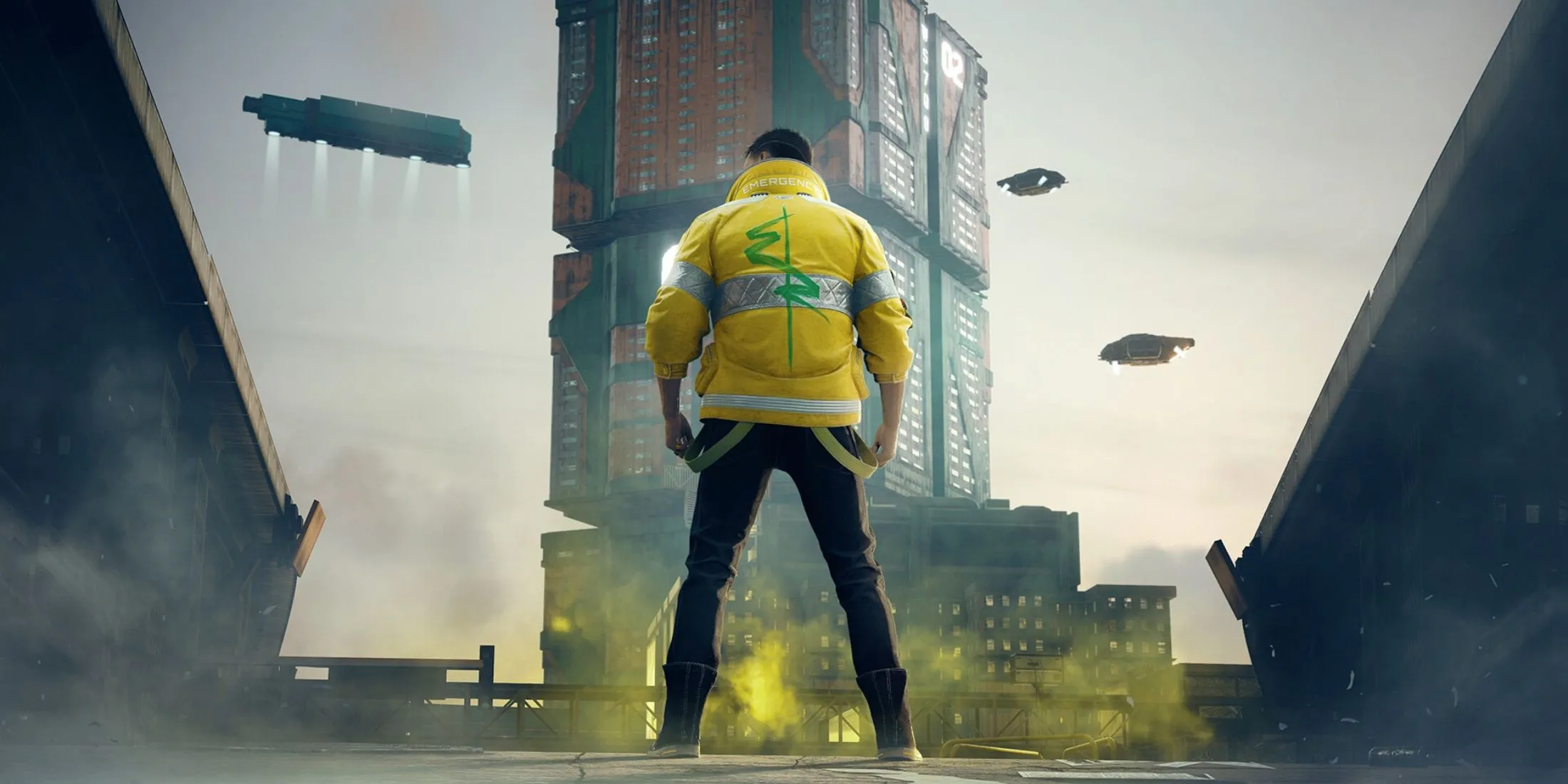 Một con phố rực rỡ ánh đèn neon ở Night City trong Cyberpunk 2077, thể hiện kiến trúc vị lai và không khí sôi động.
