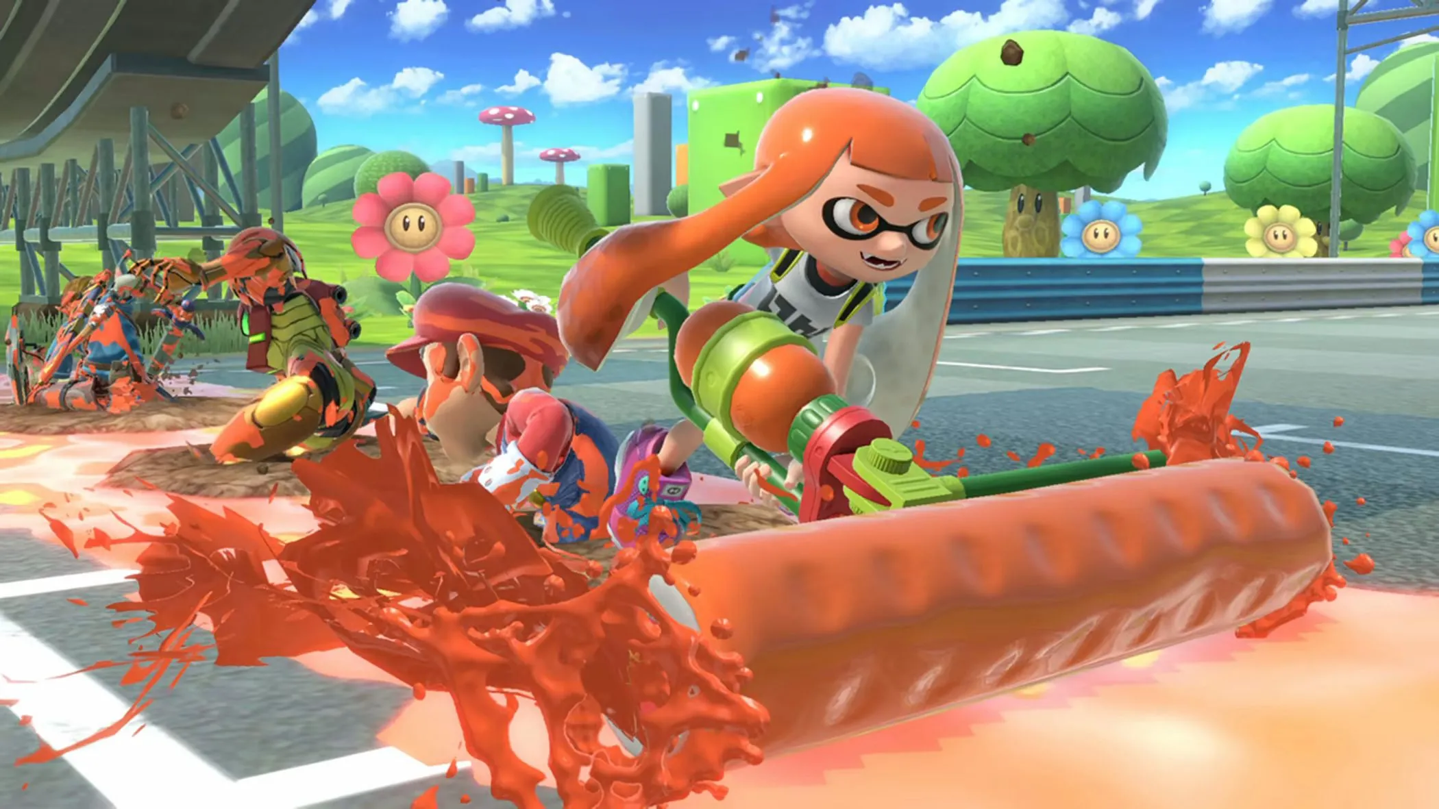 Nữ Inkling từ Splatoon vượt qua Mario và Samus trên đường đua Mario Kart trong Super Smash Bros. Ultimate
