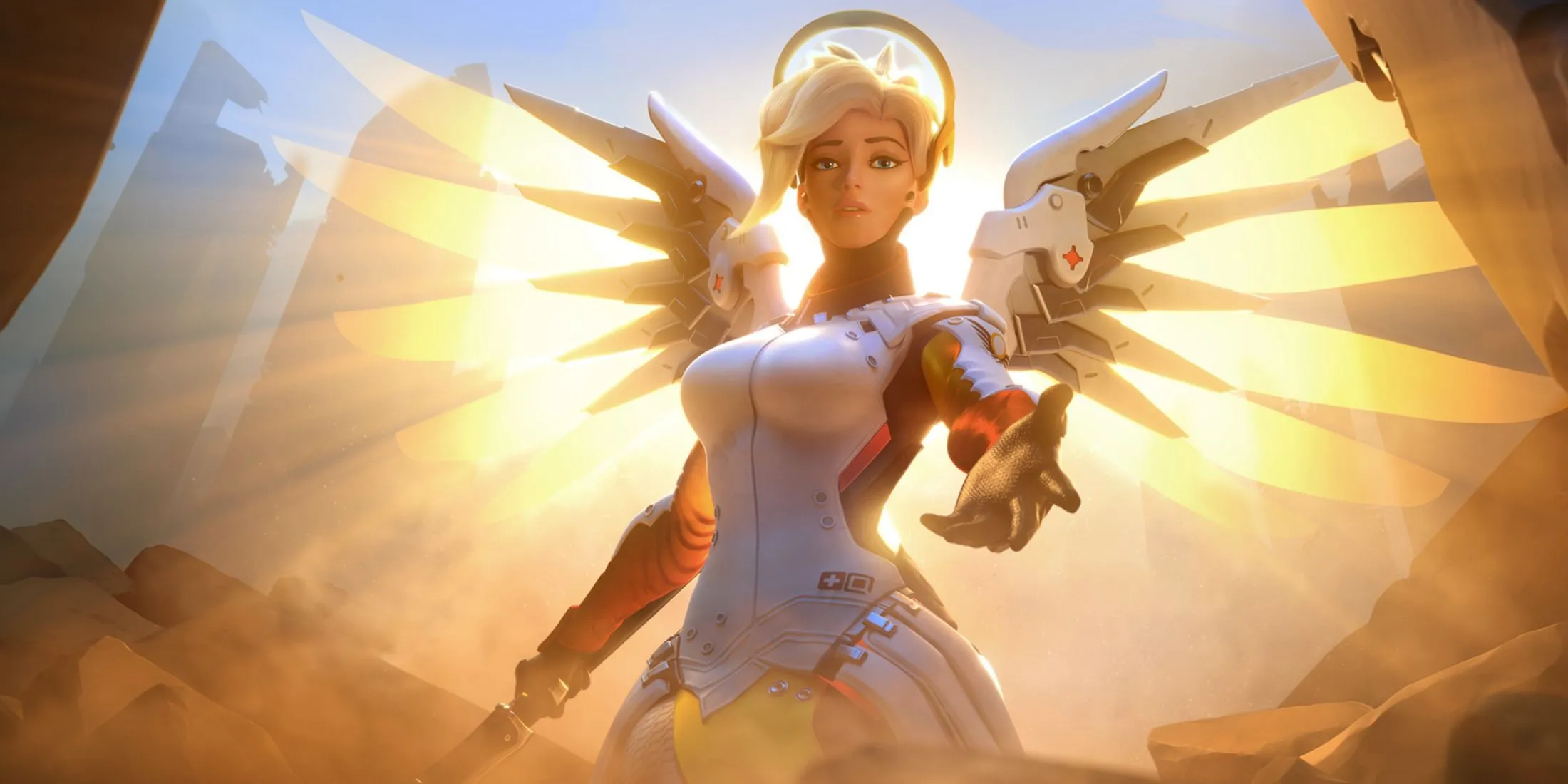 Nữ tướng Mercy trong Overwatch 2 đang bay lượn với đôi cánh vàng và sử dụng Caduceus Staff, tượng trưng cho lối chơi hỗ trợ năng động và khả năng bay lượn độc đáo của cô