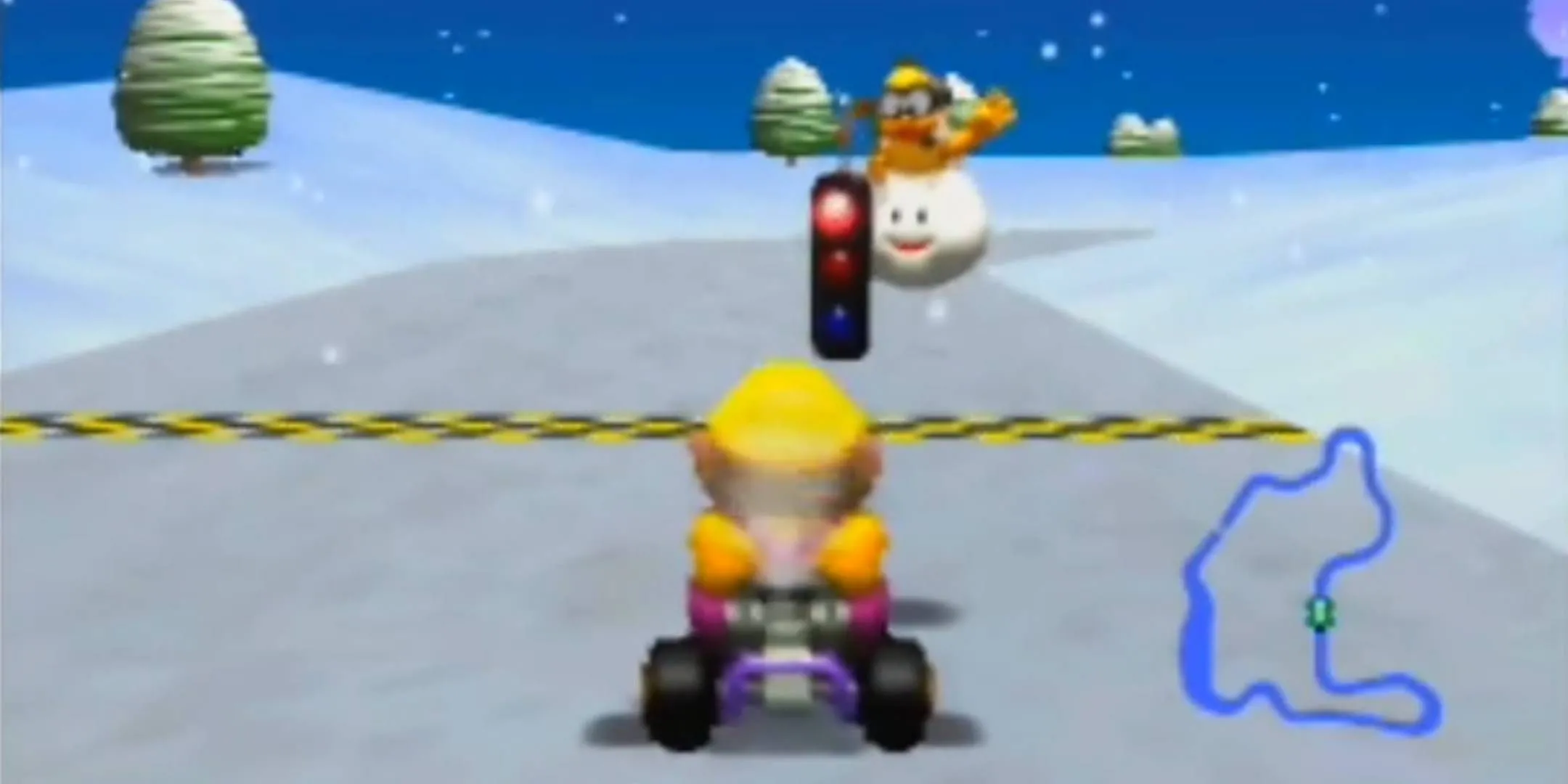 Wario chuẩn bị bắt đầu cuộc đua tại Frappe Snowland trong Mario Kart 64