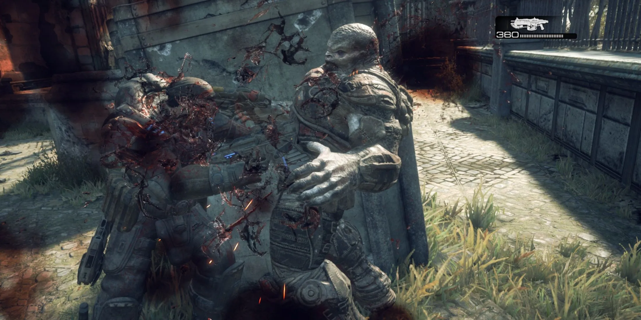 Cảnh tượng chiến đấu kịch tính trong Gears of War Reloaded, thể hiện lối chơi cận chiến và tấn công mạnh mẽ.